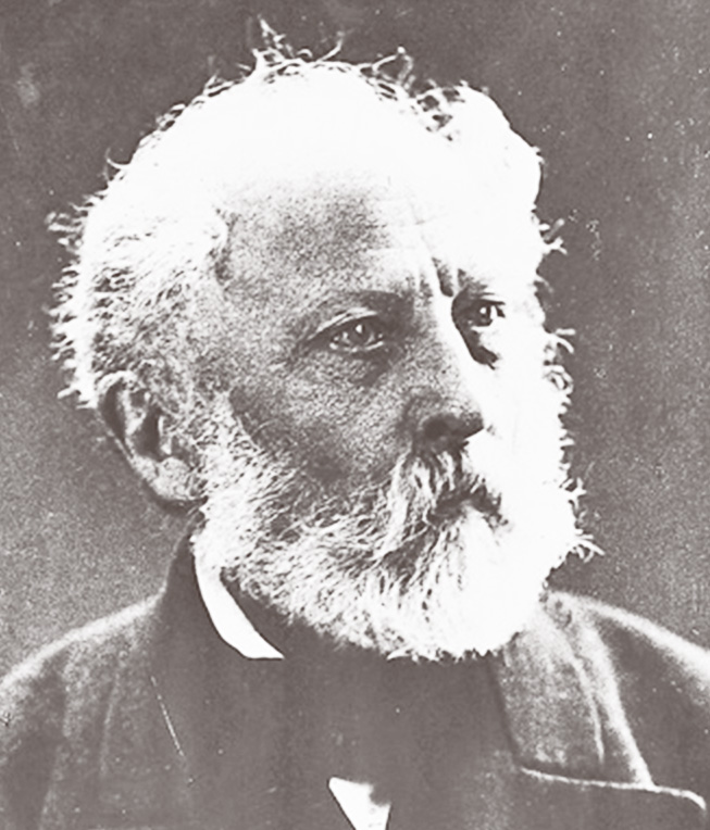 Alte Portraitaufnahme eines älteren Mannes mit weißem Haar und Bart in feinem Frack