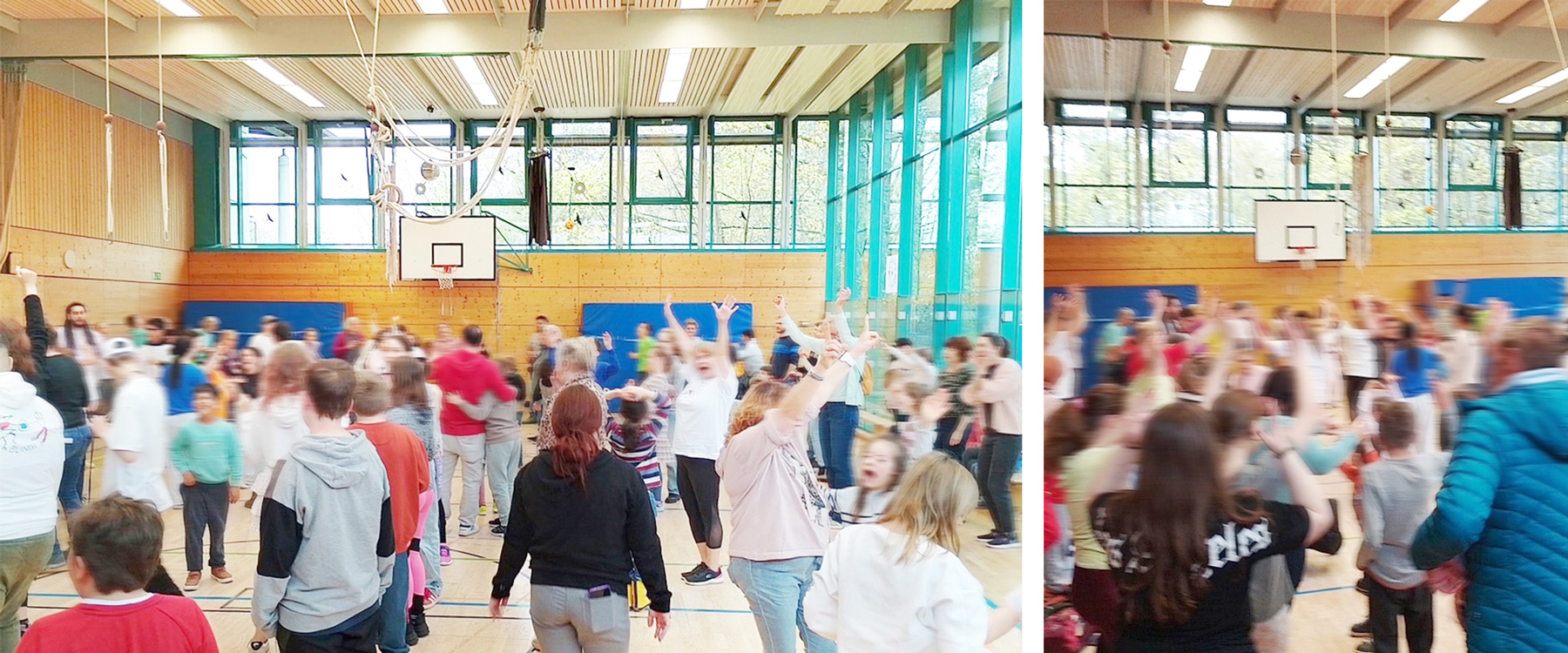 In der Turnhalle des Blindeninstituts Rückersdorf tanzen zahlreiche Kinder gemeinsam. Die Halle ist gut gefüllt, die Kinder bewegen sich zur Musik und wirken fröhlich und konzentriert. Die Szene zeigt Bewegung, Begeisterung und Gemeinschaft.
